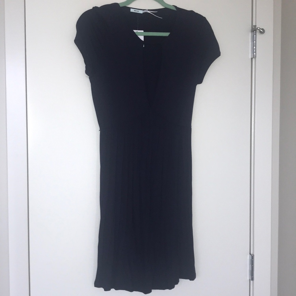 Navy blue dress with front cut out- new with tags